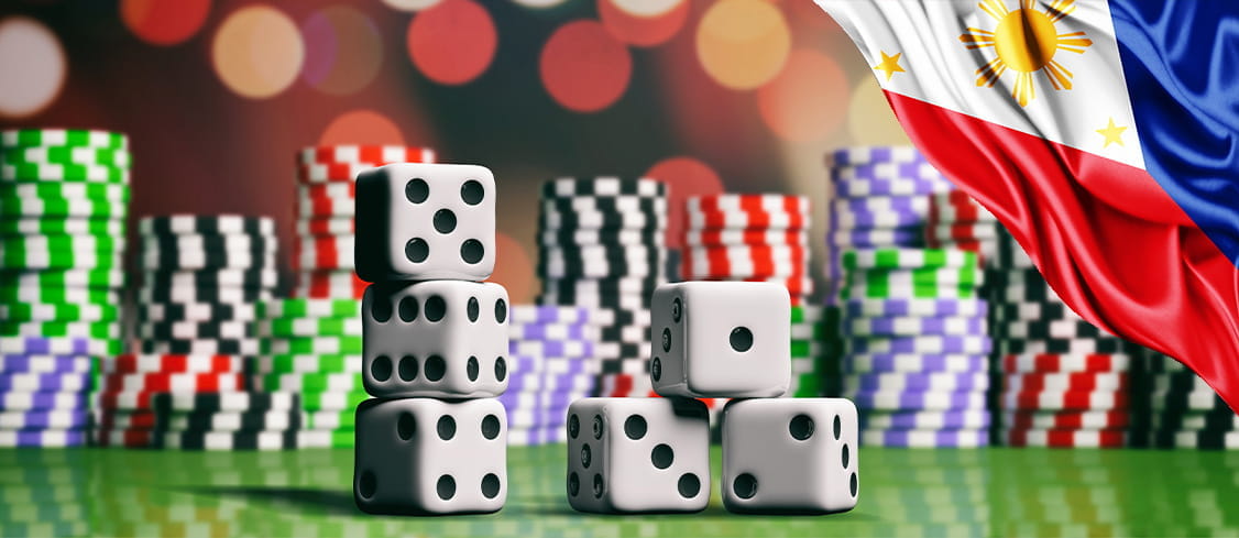 Stacked up Dice and Gambling Chips under the Filipino Flag